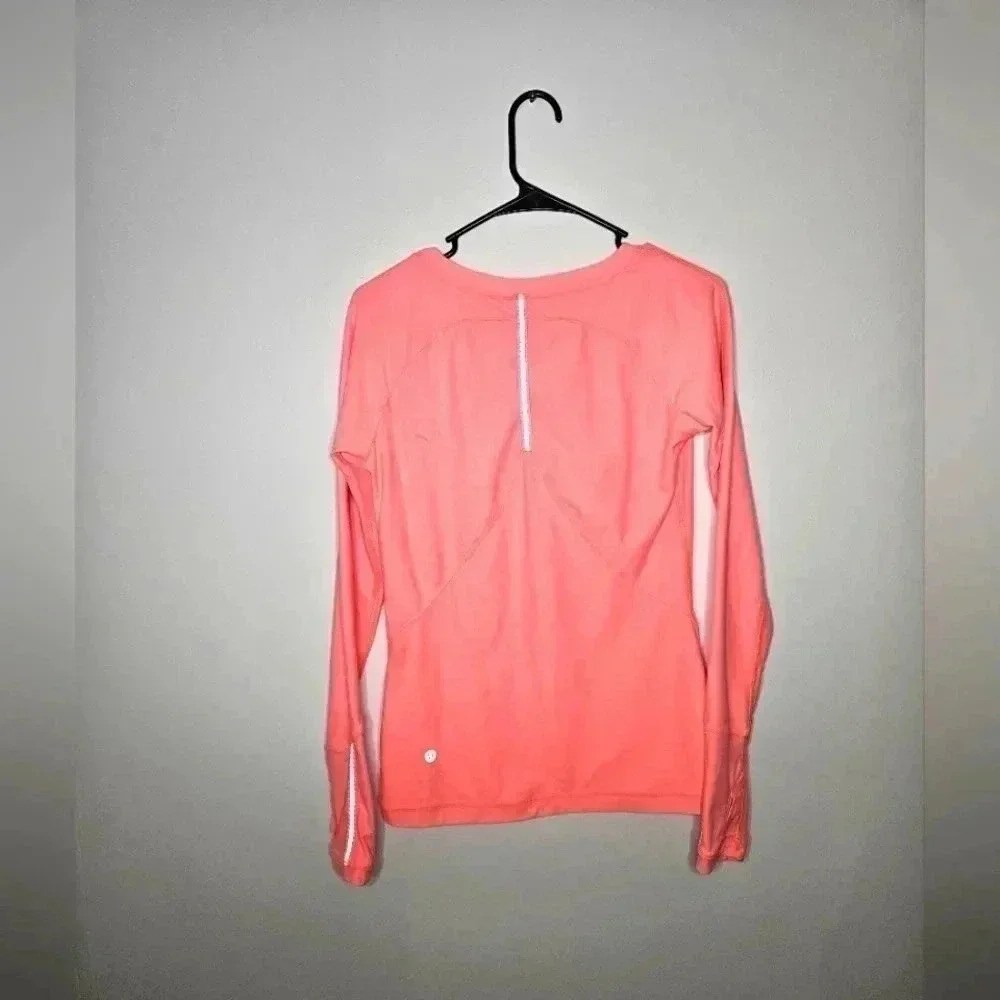 Very nice LuLu Lemon 1/4 zip pullover. Size6.‎ Sherbet orangee